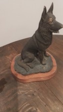 German Shepherd Dog on plinth